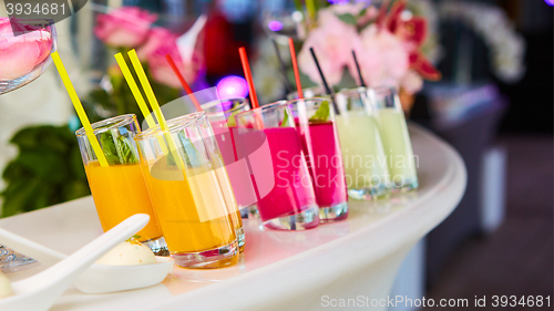 Image of Set of different vegetable juices on the bar.