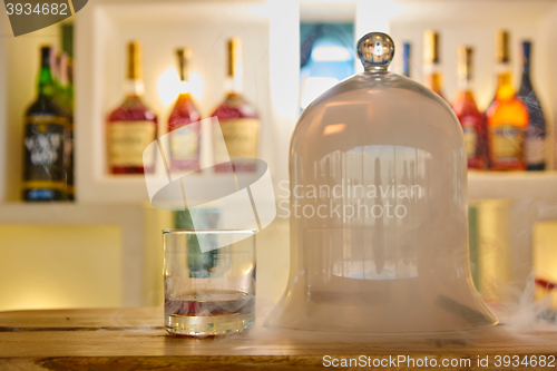 Image of Guatemalan rum under a glass dome