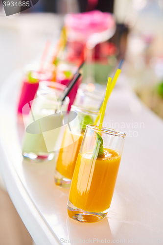 Image of Set of different vegetable juices on the bar.
