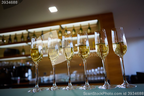 Image of row of champagne glasses