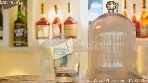 Image of Guatemalan rum under a glass dome