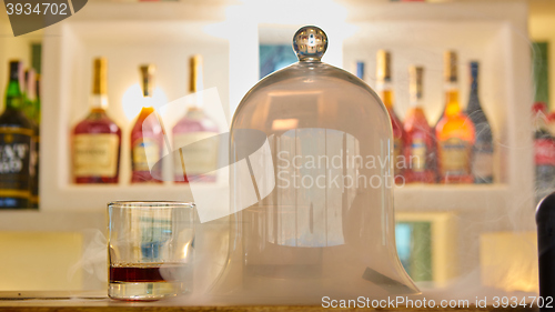 Image of Guatemalan rum under a glass dome