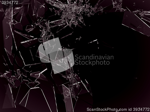 Image of Pieces of demolished or Shattered glass on black