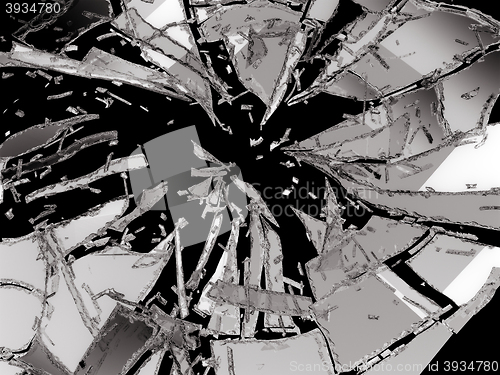 Image of Broken and damaged glass isolated over black