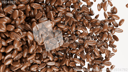 Image of roasted coffee beans tossed and mixed isolated 