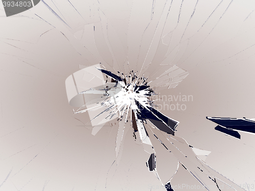 Image of Broken glass with bullet hole on white