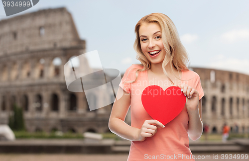 Image of happy woman or teen girl with red heart shape