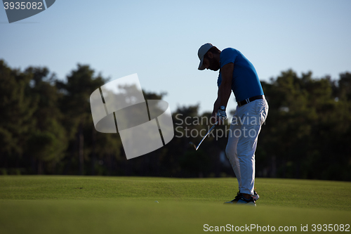 Image of golfer hitting long shot