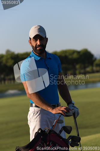 Image of golfer  portrait at golf course