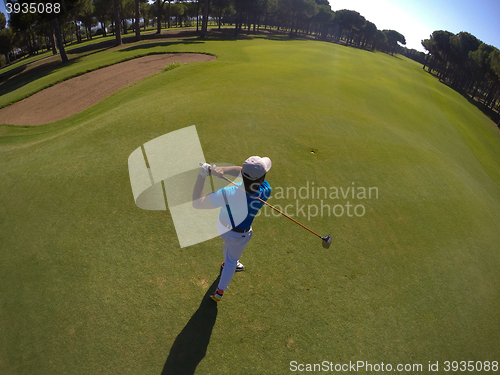 Image of top view of golf player hitting shot