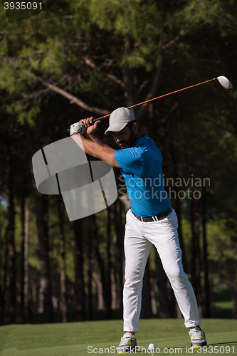 Image of golf player hitting shot