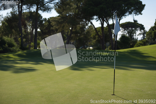 Image of golfer hitting a sand bunker shot