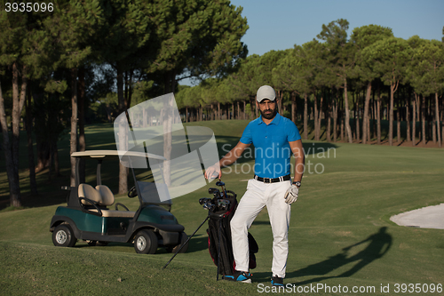 Image of golfer  portrait at golf course