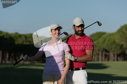 Image of portrait of couple on golf course
