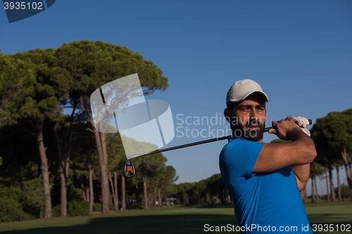 Image of golf player hitting shot