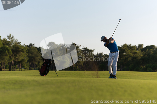 Image of golfer hitting long shot