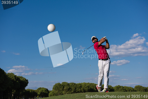 Image of golf player hitting long shot