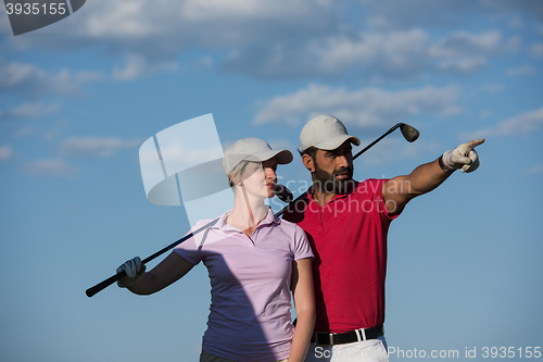 Image of portrait of couple on golf course