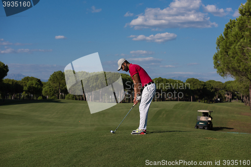 Image of golf player hitting long shot