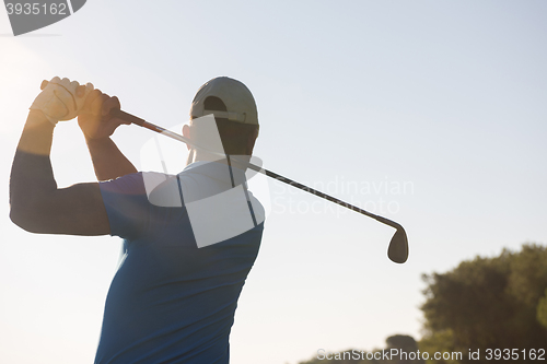 Image of golf player hitting shot