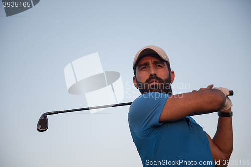 Image of golfer hitting long shot