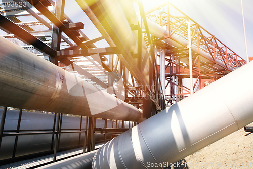 Image of Equipment, cables and piping as found inside of a modern industr