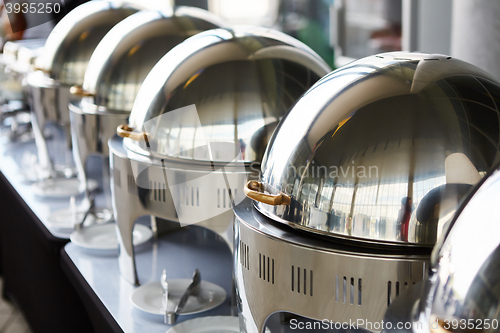 Image of Buffet Table with Row of Food Service Steam Pans