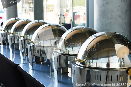 Image of Buffet Table with Row of Food Service Steam Pans