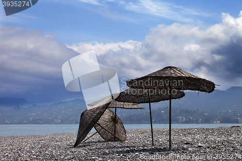 Image of Old sunshade on deserted beach