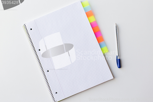 Image of close up of organizer and pen on office table