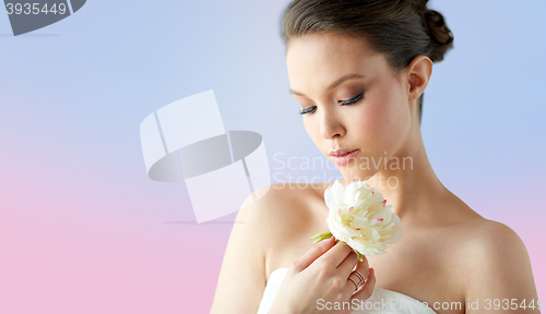 Image of beautiful asian woman with flower and jewelry