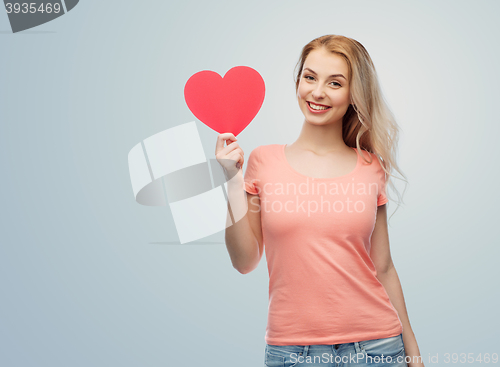 Image of happy woman or teen girl with red heart shape