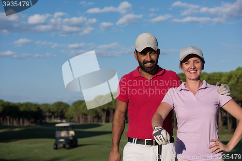 Image of portrait of couple on golf course