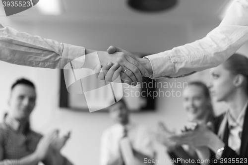 Image of business womans handshake