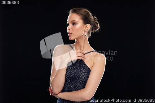 Image of beautiful young asian woman with diamond earring