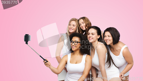 Image of group of happy women taking selfie by smartphoone