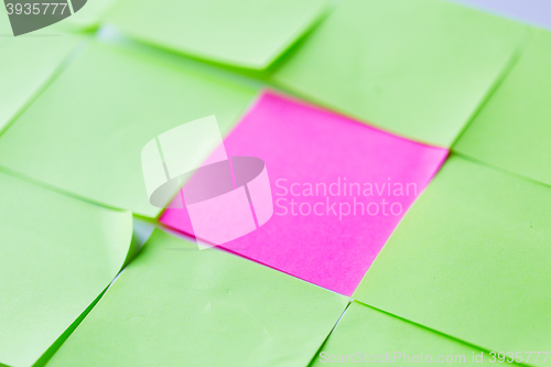 Image of close up of different color paper stickers