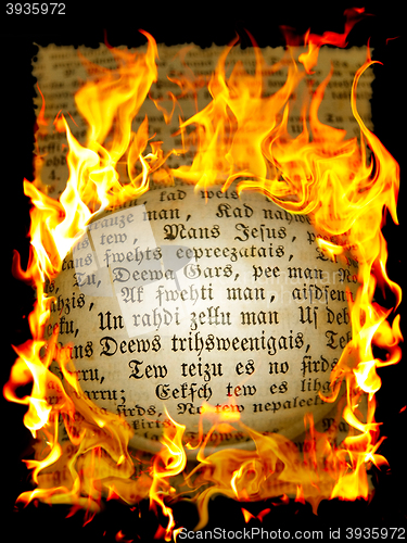 Image of Old Text In Flame