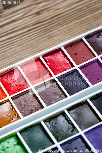 Image of watercolor paint-box. selective focus