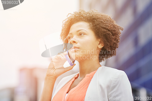 Image of african businesswoman calling on smartphone