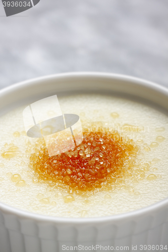 Image of Ramekin filled by wheat semolina (farina) with milk and brown ca