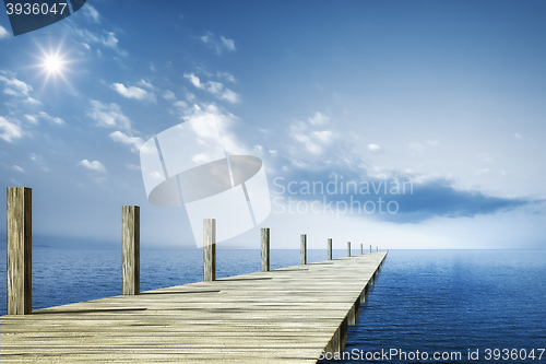 Image of wooden jetty blue ocean