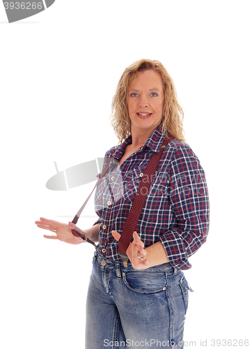 Image of Woman in checkered shirt and suspender.