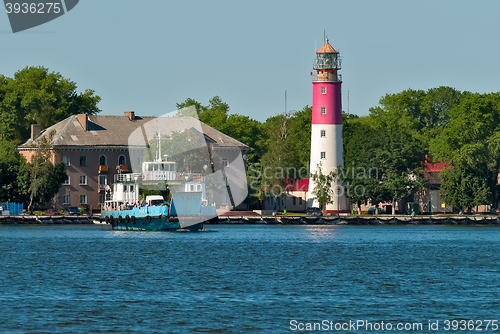 Image of Nida ferry boat and lighthouse in Baltiysk. Russia