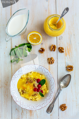 Image of Millet porridge with lemon cream for a healthy diet.