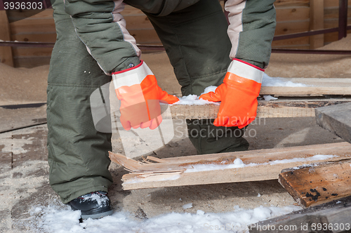 Image of Carpenter working at sawmill 