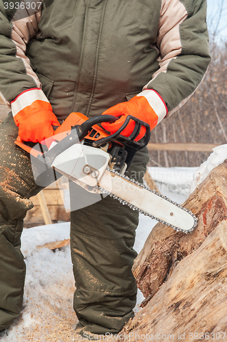 Image of Carpenter working at sawmill 