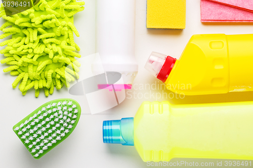 Image of House cleaning products on white table