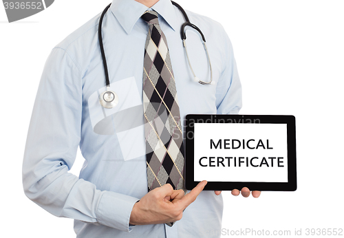 Image of Doctor holding tablet - Medical certificate