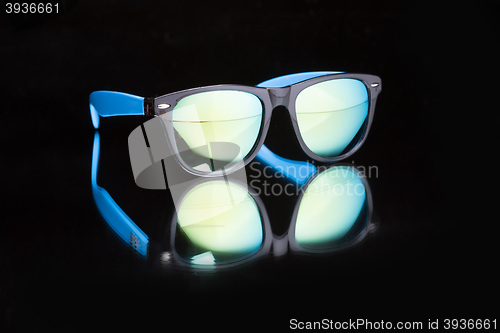 Image of colored sunglasses.
